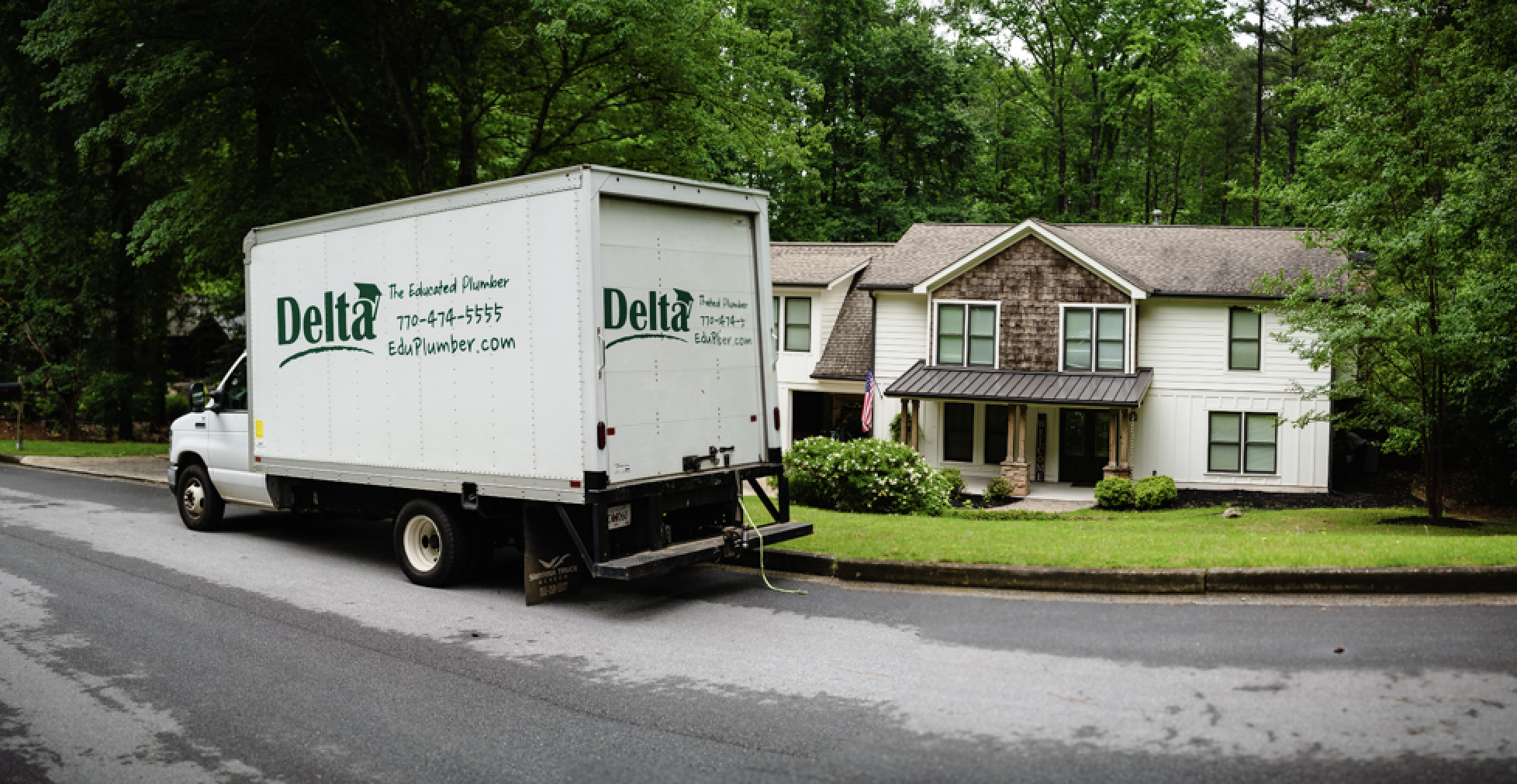 delta truck in front of house