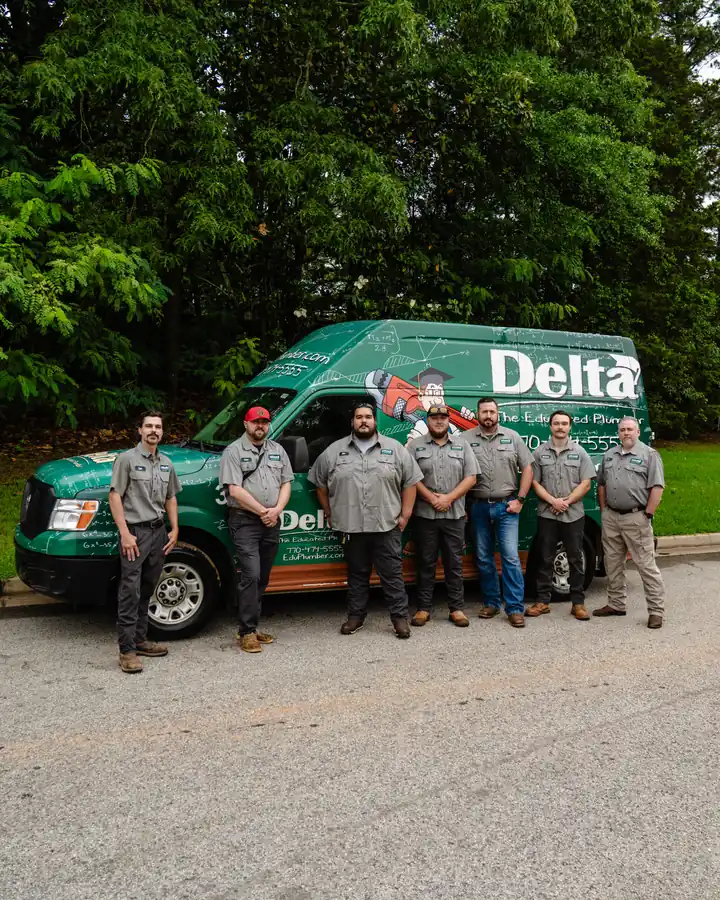 Delta Plumbing team with their service vans