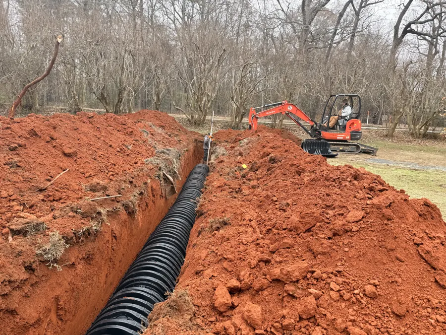 Delta crew installing a septic drain field with chambers in Metro Atlanta
